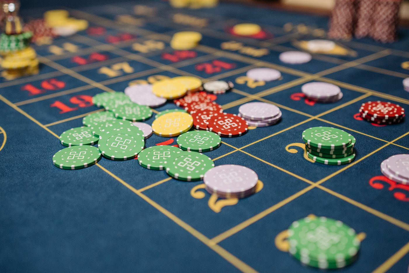Colourful chips on a roulette betting table
